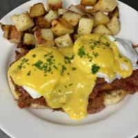 Hash and Eggs · Homemade corned beef hash and 2 eggs any style.