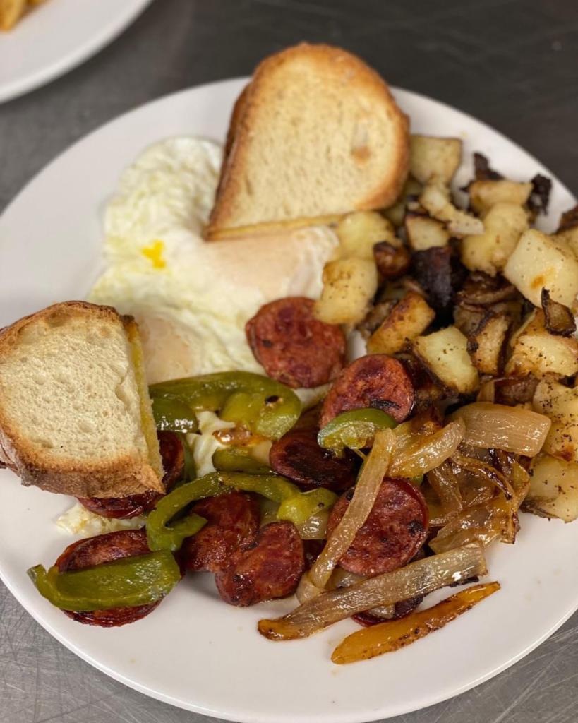 Chourico & Eggs · 2 eggs served any style with sliced chourico, pepper, and onions.