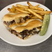 The Ultimate Steak Sandwich · A juicy 6 oz. choice rib-eye topped with sautéed mushrooms, onions and cheese on a grilled t...
