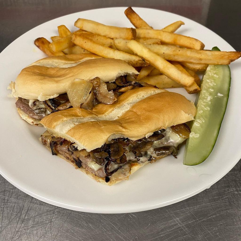 The Ultimate Steak Sandwich · A juicy 6 oz. choice rib-eye topped with sautéed mushrooms, onions and cheese on a grilled torpedo roll.