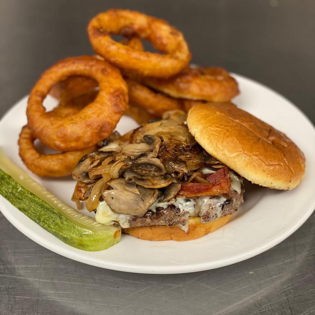 Miss Lorraine Burger · 6-oz. black Angus beef, grilled mushrooms, caramelized onions, bacon and melted cheese. Served on a grilled brioche roll.