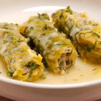 Cabbage Leaves (3) · Hand-rolled cabbage leaves stuffed with seasoned ground beef and rice