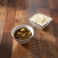 Saag Paneer · A delicious combination of homemade cheese and spinach. Veggie.