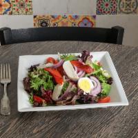 House Salad · Spring mix, cherry tomatoes, red onions, roasted peppers, fresh mozzarella, olives, and hard...