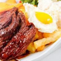 Bistec a lo Pobre · Top sirloin Steak served with French fries, egg, banana plantains and white rice.