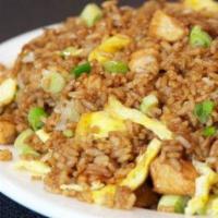 Chicken Arroz Chaufa · Stir fry rice with vegetables, including Chinese onions, eggs, soy sauce and chicken quickly...