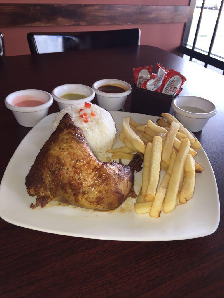 Combo # 4 · 1 whole chicken, and a half chicken + 3 side orders of your choice  (rice - fries - salad - beans)