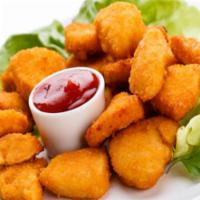 Kids Nuggets · Chicken nuggets served with french fries.