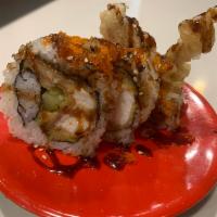 Spider Roll · Soft shell crab, avocado, cucumber and masago eel sauce.