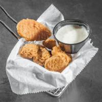 Frickles · Fried pickles 5 oz. with ranch dipping sauce.