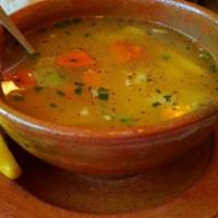 Sopa de Pollo · Chicken soup with vegetables.