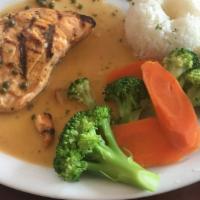 Grilled Salmon · Fresh filet of salmon grilled and topped with a white caper sauce. Served with jasmine rice ...