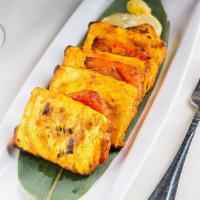 11. Tandoori Paneer Tikka · Indian cottage cheese with spices cooked on skewers.