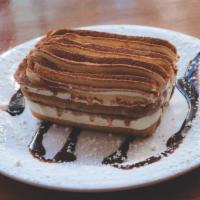 Tiramisu · An Italian dessert made with mascarpone, espresso-soaked ladyfingers, whipped cream, and a d...