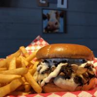 Swiss Burger · Topped with melted Swiss cheese, grilled mushrooms and caramelized onions with garlic aioli.