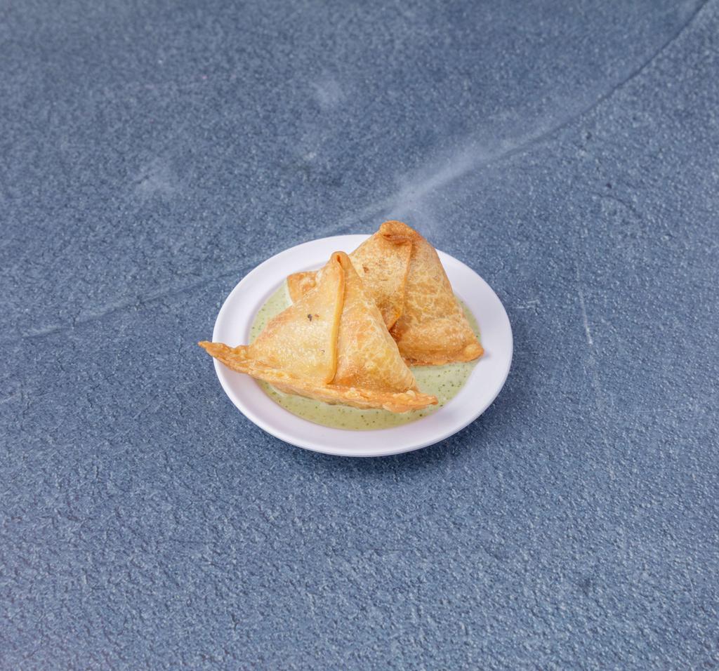 1. Two Pieces Samosa · Crisp turnover filled with spiced potatoes.