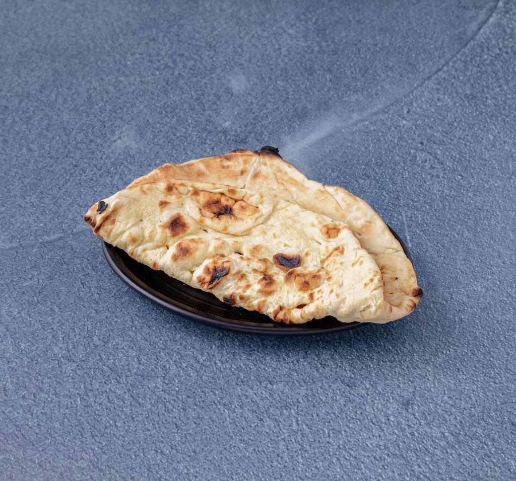 39. Naan · Traditional Punjabi bread of super fine flour.