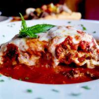 Lasagna Bolognese Lunch · Our homemade meat lasagna layered with ground beef, fresh ricotta, and mozzarella cheese.