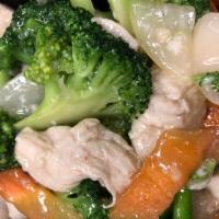 Broccoli · Broccoli, carrots and onions. Served with white rice.