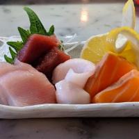 3 Piece Sashimi and 6 Piece California Roll Lunch · Served with miso soup or house salad.
