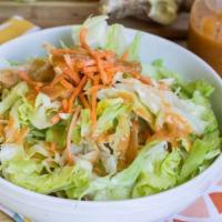 House Ginger Salad · Fresh green salad served with ginger dressing.