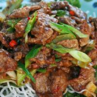 Mongolian · Sliced beef sauteed with green peppers, fresh mushrooms and onions in spicy garlic sauce. Se...