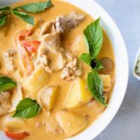 Large Pineapple Curry · Coconut milk with a delicate red curry paste, bell pepper, onion and pineapple. Served with ...