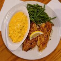Grilled Cajun Catfish · 2 tender farm-raised fillets, coated with our spicy Cajun seasoning, then grill and served o...