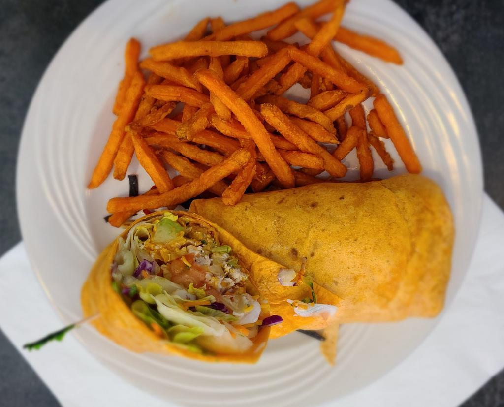 Southwest Chicken Wrap · Grilled or fried chicken with fresh avocado slices, Romaine lettuce, Cheddar cheese, Monterey Hack cheese, pico de gallo and jalapeno ranch dressing. Wrapped in a chipotle flour tortilla.
