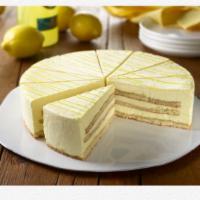 Limoncello Mascarpone Cake · Alternating layers of sponge cake and lemon infused mascarpone cream, decorated with lemonce...