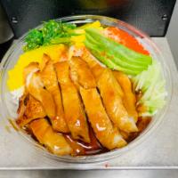 Chicken Teriyaki Poke Bowl · Serve with avocado, cucumber, oshinko, mango, tobiko , seaweed salad and white rice 