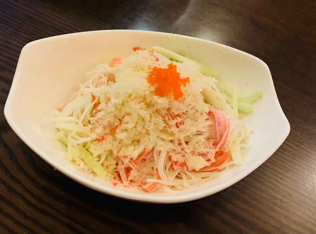 Kani Salad · Served with Kani , cucumber, caviar, Japanese mayonnaise  and crunchy 