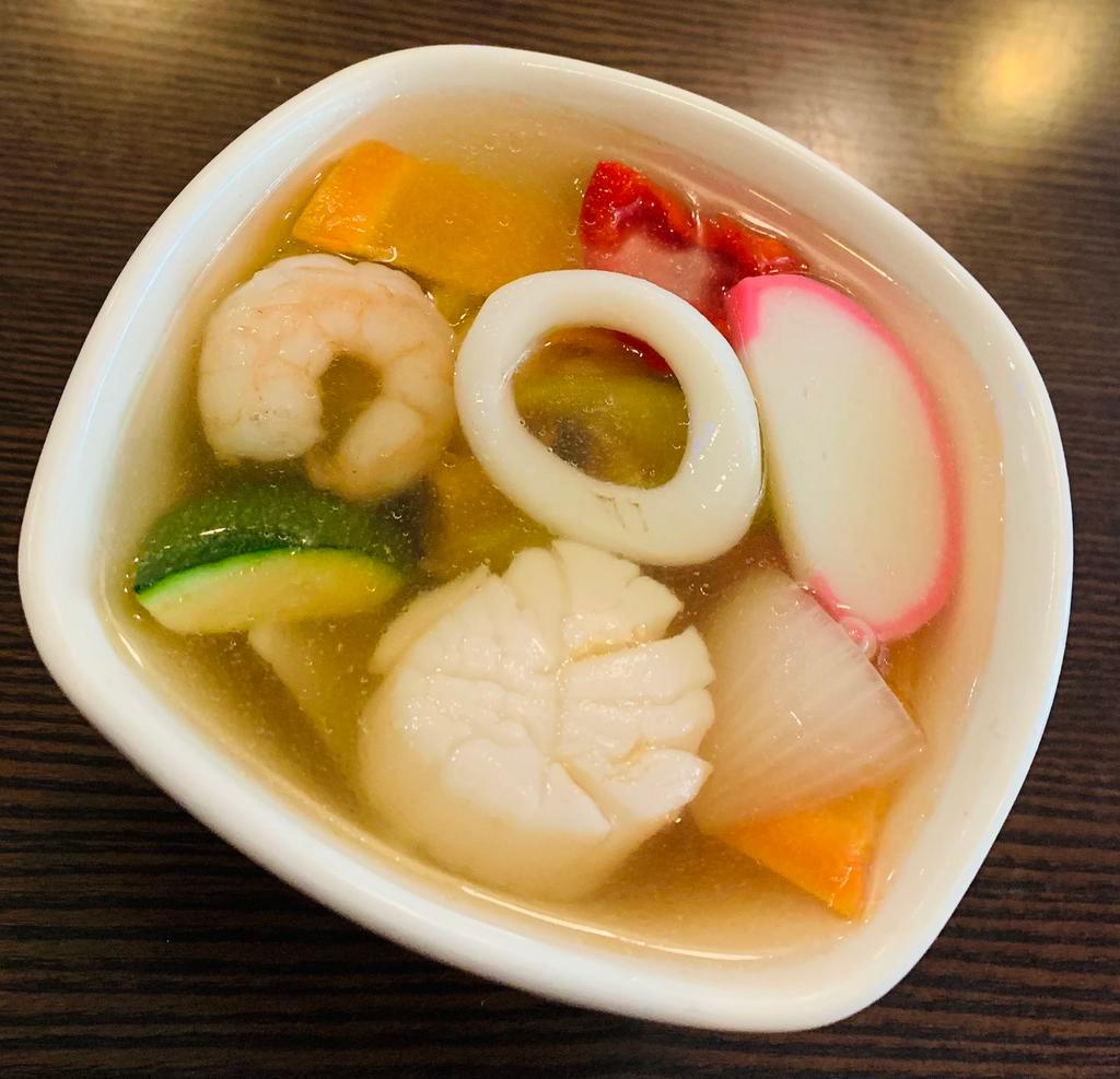 Seafood Soup  · Served with shrimp, scallop, squid and vegetables.