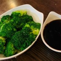 Steamed Broccoli · Choice of garlic sauce , thai brown sauce or oyster sauce