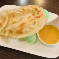 Indian Pancake · Served with shrimp cracker and curry dipping sauce.