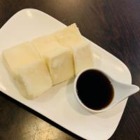 Age Tofu · Fried Japanese tofu serve with tempura sauce 