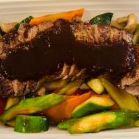 Rib Eye Steak · Sauteed mixed vegetables in chef's special sauce. 