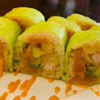 Ocean Roll · Shrimp tempura, spicy salmon crunch, avocado and spicy mayo wrapped with soy paper
