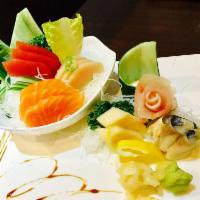 Sashimi Deluxe · 17 pieces of assorted sashimi. Choice of soup or salad.