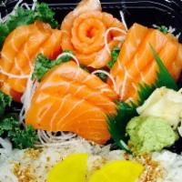 Salmon Don · 12 pieces of salmon sashimi with sushi rice. Choice of soup or salad.