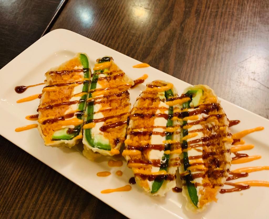 Jalapeno Spicy Tuna · Batter fried with spicy tuna, cream cheese, jalapeno, and spicy eel sauce.