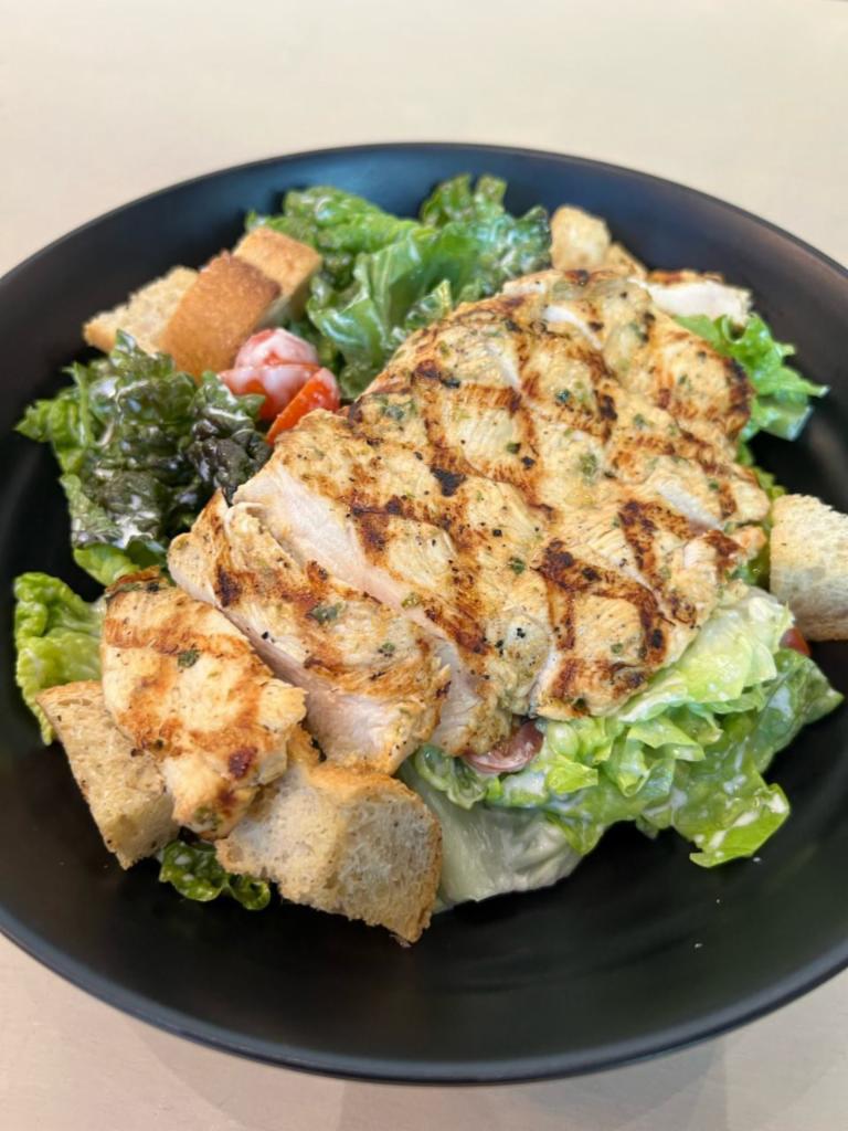 Caesar Salad · Mayonnaise, Sour Cream, Lemon Juice, Pepper, Egg, Chives, Parmesan Cheese, Grilled Chicken