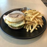 Avocado And Egg Sandwich · English Muffin, Fried Egg, Avocado, Butter, Served with Fries 
(Add Sriracha Bacon / Sausage...