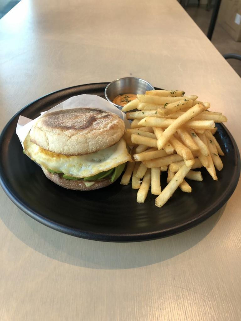 Avocado And Egg Sandwich · English Muffin, Fried Egg, Avocado, Butter, Served with Fries 
(Add Sriracha Bacon / Sausage /  Chicken +$2)
