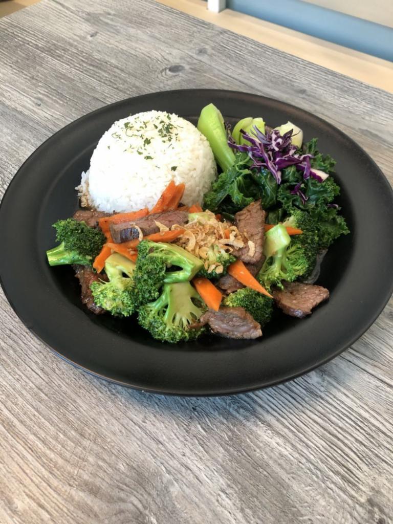 Broccoli Beef · Beef, Broccoli, Carrot, Wok in Our Gluten-Free Garlic Sauce. Served with Steamed Rice, Kale and Bok Choy.