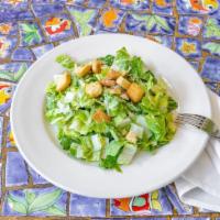 Caesar Salad · Chopped romaine lettuce tossed with our creamy caesar dressing and homemade croutons