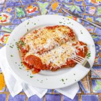 Chicken Parm · Breaded Chicken topped with mozzarella and tomato sauce