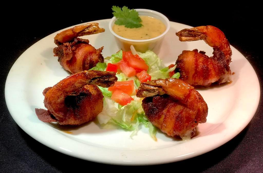 Shrimp Matamoros Appetizer · 4 gulf jumbo shrimp stuffed with jalapenos, Monterrey Jack cheese and wrapped in bacon.