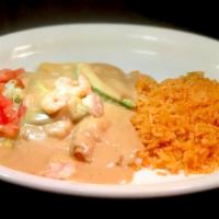 Cajun Mahi Mahi · Fresh mahi mahi topped with shrimp and our delicious chipotle sauce. A must for seafood love...