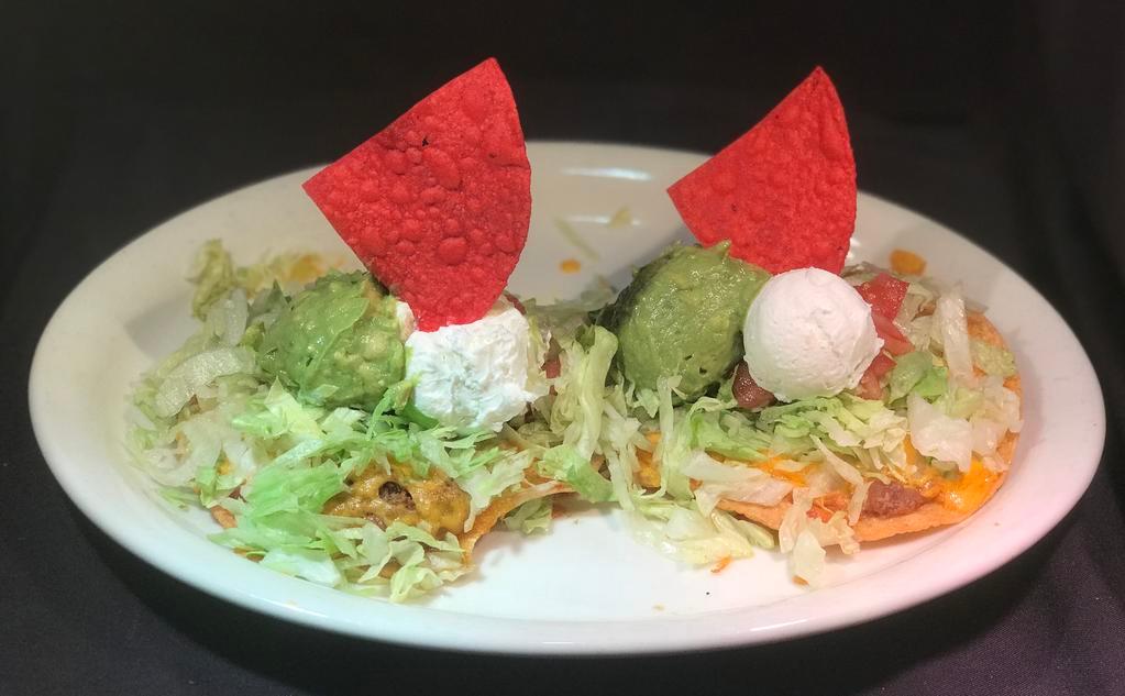 Tostada Compuesta · Choice of 2 beef, chicken or bean and cheese chalupas with lettuce, tomato, guacamole and sour cream.
